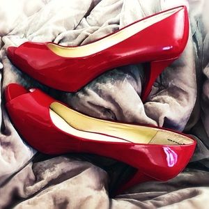 NINE WEST women’s ruby red peep toe heels. 7.5